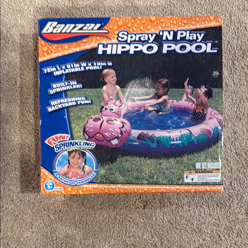 Banzai Spray 'N Play Hippo Pool. Inflatable pool. Never opened. New.
